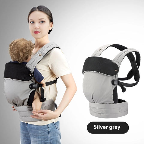 Mother wearing grey ergonomic baby carrier front carry