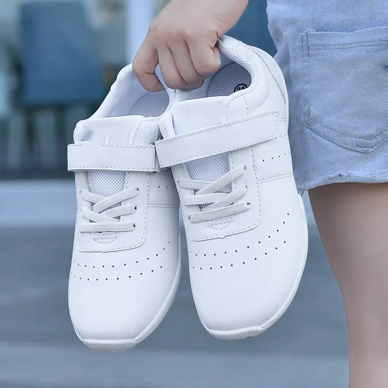 White kids sports shoes with secure hook and loop strap