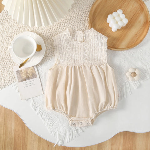 Sleeveless baby playsuit lace bodice popper closure