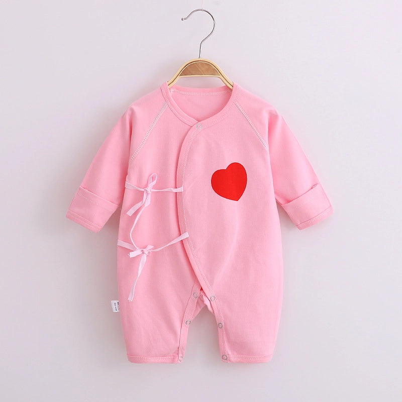 Soft cotton baby romper with wrap front and tie fastening